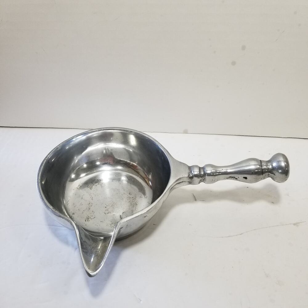 Vintage heavy sauce bowl with handle has dent 4.1349